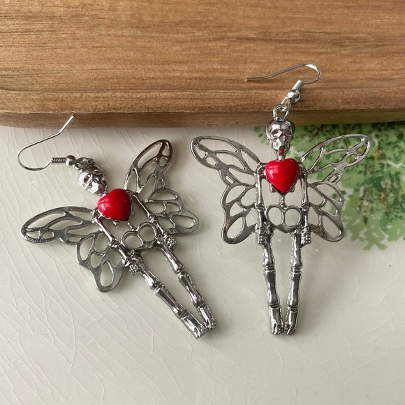 ✨Modcloth Morlina Fairy Skeleton Earrings - Picture 1 of 9